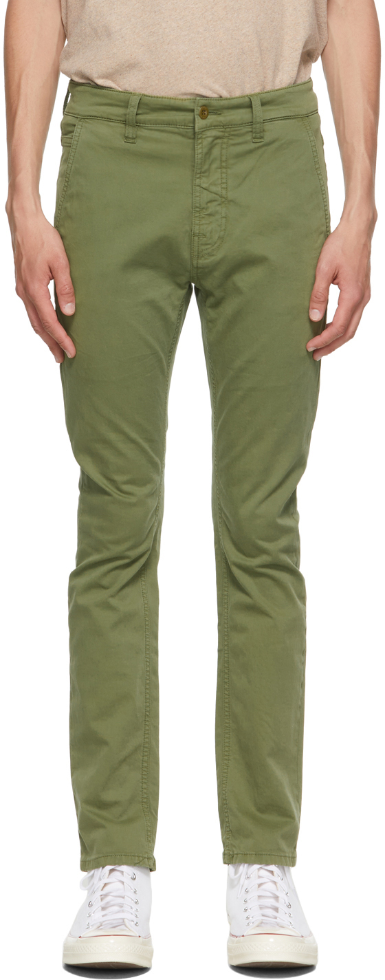 Click to view more detailed imagery on our partner's website Nudie Jeans Green Slim Adam Chino Trousers In Bunker