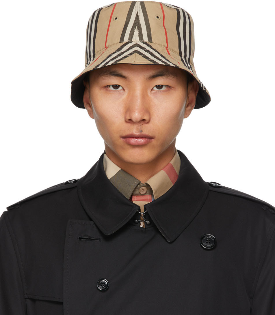 Burberry: Reversible Beige Cotton Icon Stripe Bucket Hat | SSENSE