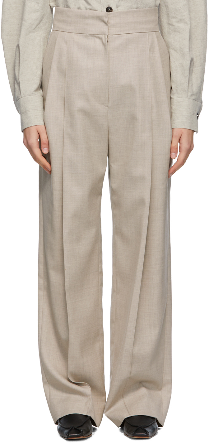 LOW CLASSIC: Beige Pintuck Trousers | SSENSE Canada