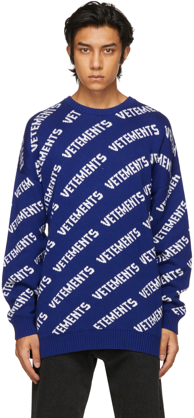 VETEMENTS: Blue & White Allover Logo Sweater | SSENSE