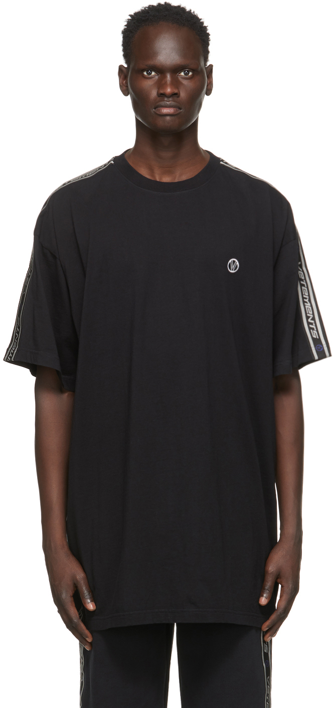 VETEMENTS: Black Tape Logo T-Shirt | SSENSE