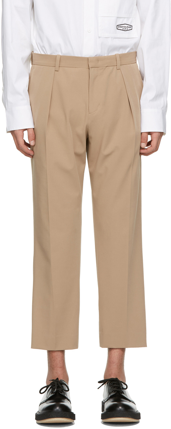 Wooyoungmi: Beige Cuffed One Pleat Trousers | SSENSE