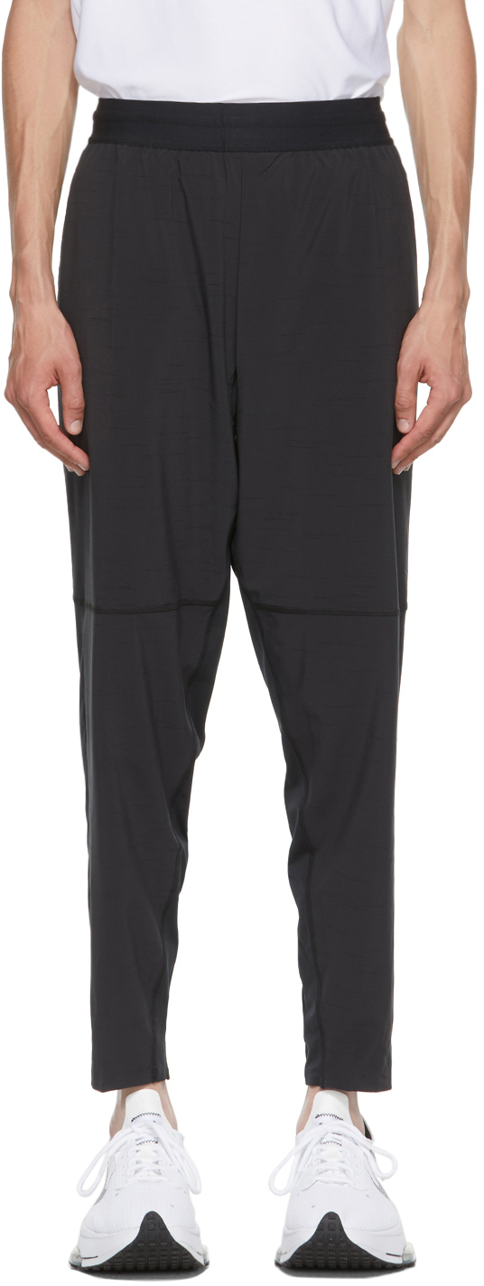 grey nike sweatpants with black zipper