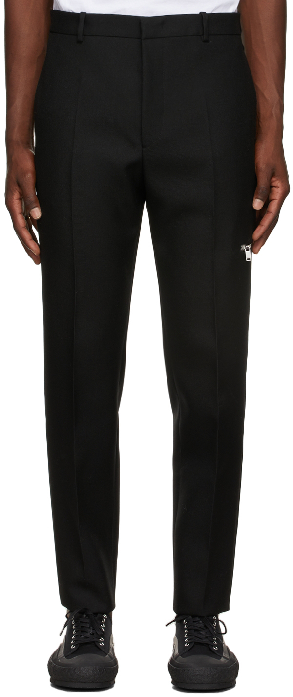 black trousers with zip pockets