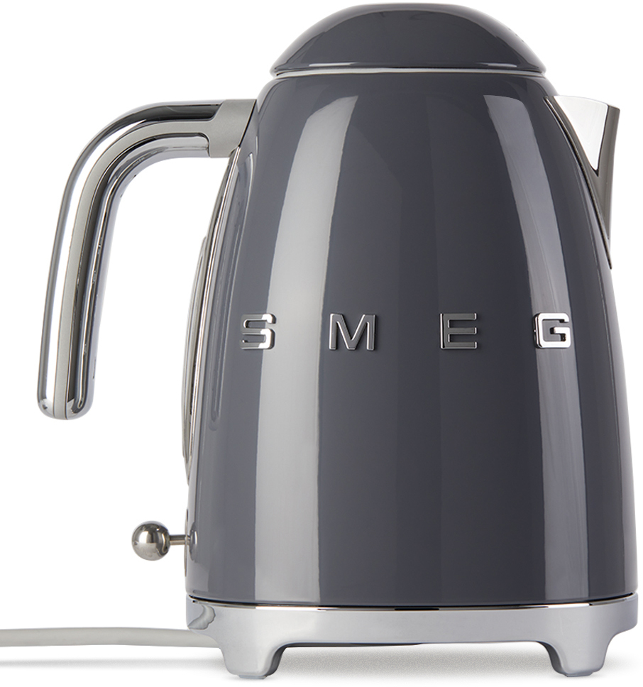 https://img.ssensemedia.com/images/212308M609024_1/smeg-grey-electric-kettle-17-l-caus.jpg