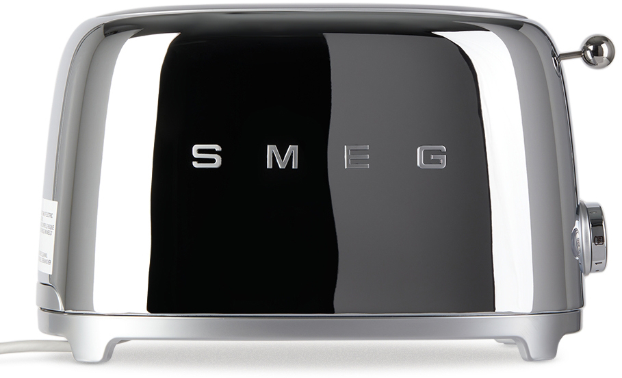 https://img.ssensemedia.com/images/212308M611009_1/smeg-silver-retro-style-2-slice-toaster.jpg
