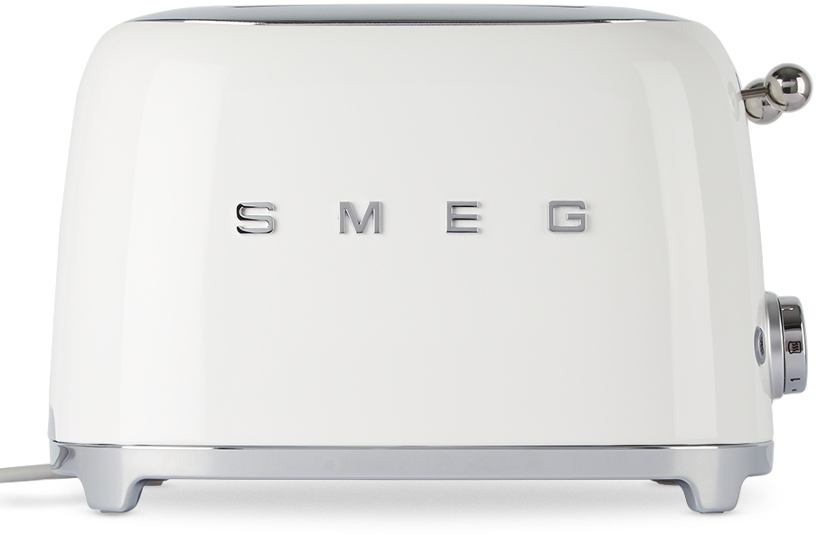 https://img.ssensemedia.com/images/212308M611062_1/smeg-white-retro-style-4-slice-toaster.jpg