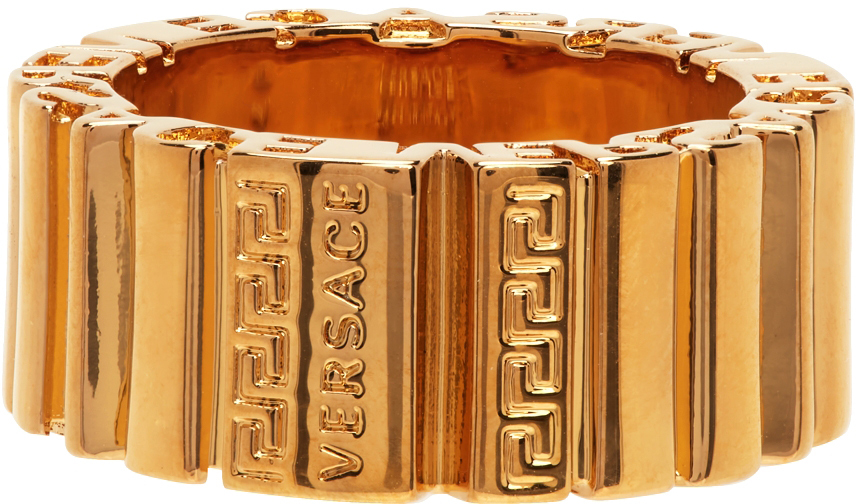 Versace Logo-engraved Greca Ring In 3j000 Gold
