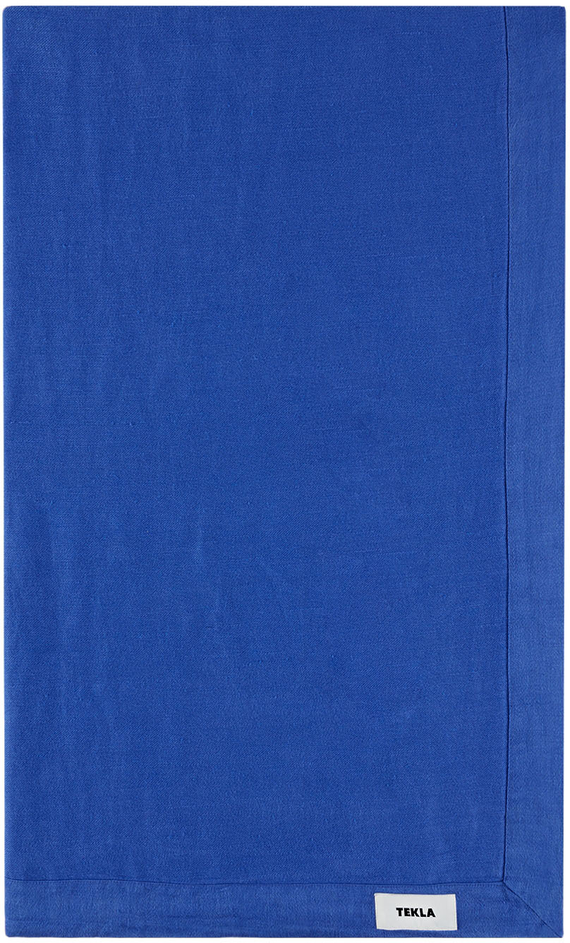 https://img.ssensemedia.com/images/212482M629003_1/tekla-blue-linen-table-cloth.jpg