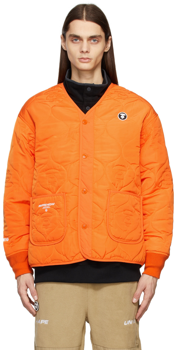 orange quilted jacket