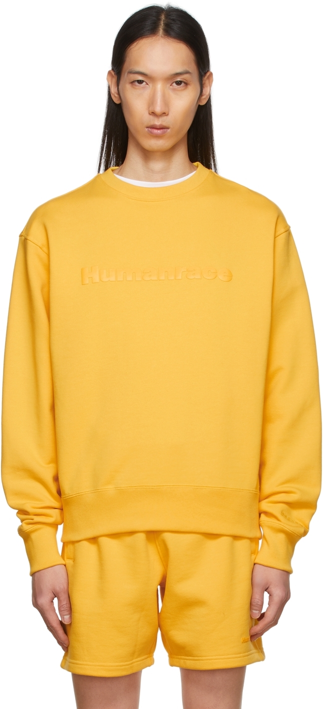 impresión Conjugado tira SSENSE Exclusive Yellow Humanrace Tonal Logo Sweatshirt by adidas x  Humanrace by Pharrell Williams on Sale