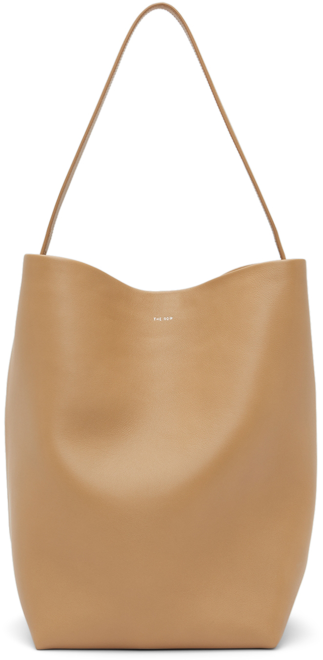 The Row: Beige Park Tote | SSENSE