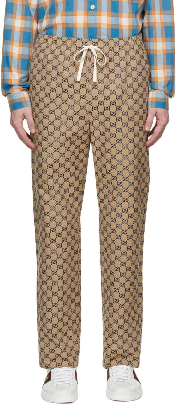 Gucci allover GGprint Trousers  Farfetch
