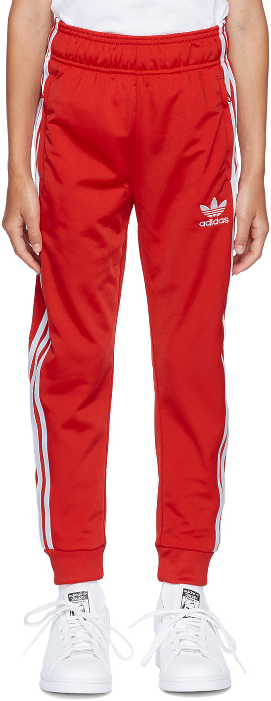 red sst track pants