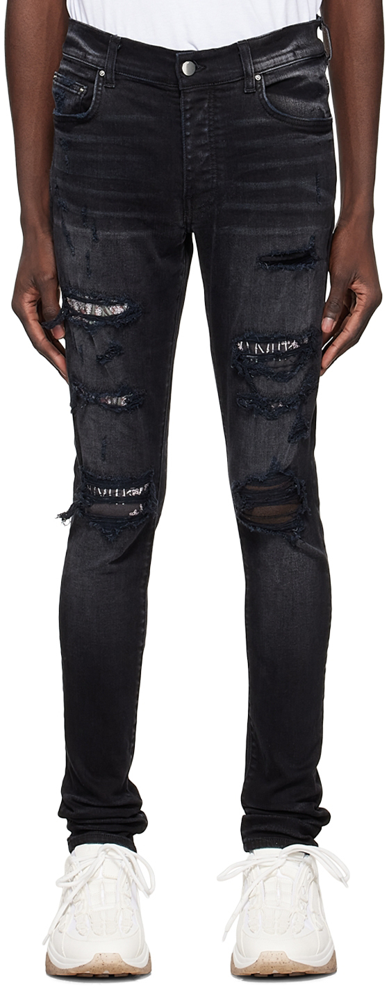 Shop Amiri Black Hibiscus Artpatch Jeans In Aged Black-12 oz Ita
