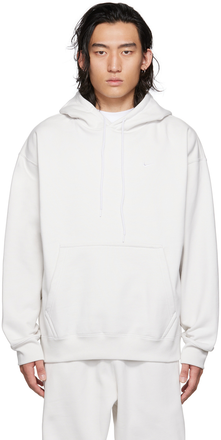 White Solo Swoosh Hoodie by Nike on Sale