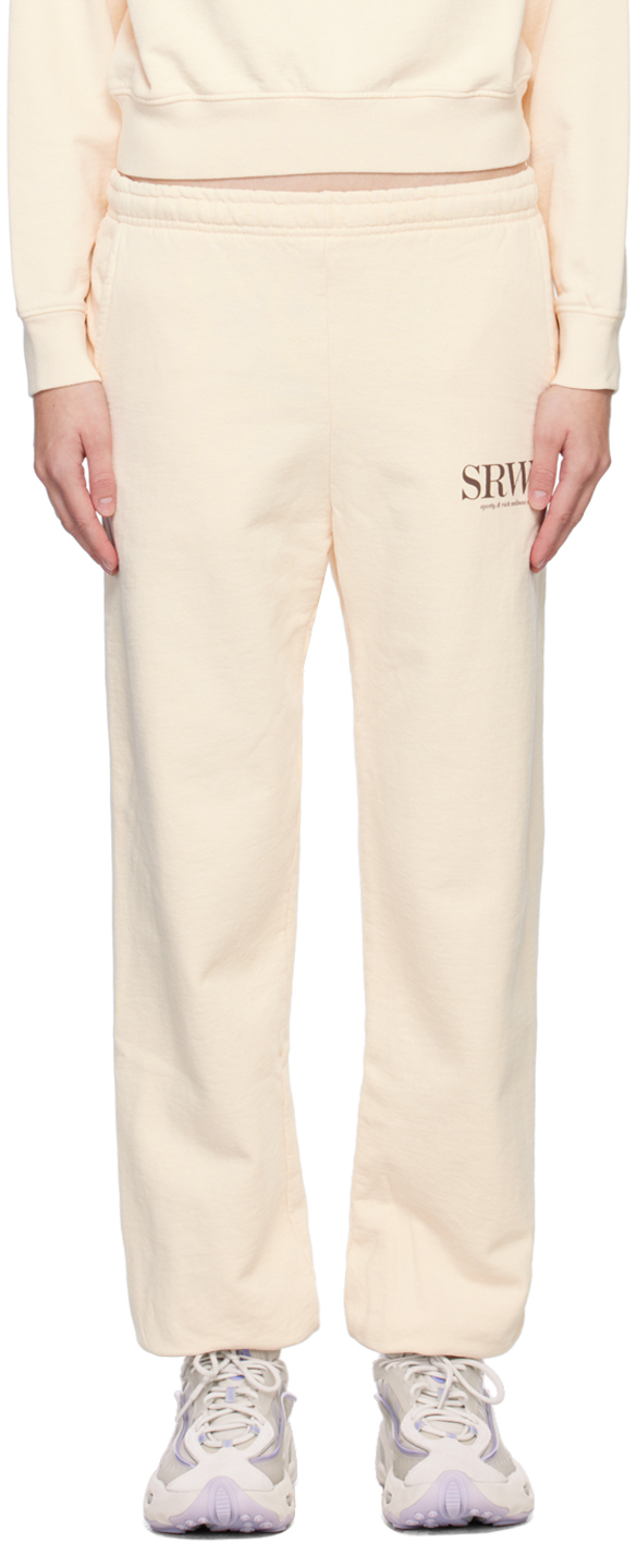 Sporty And Rich Upper East Side Logo-print Cotton-jersey Jogging Bottoms In Beige