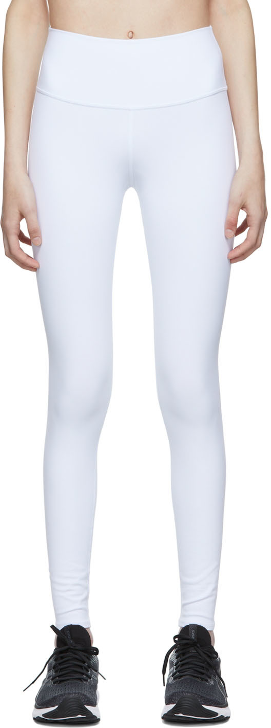 https://img.ssensemedia.com/images/222790F531009_1/alo-white-nylon-sport-leggings.jpg