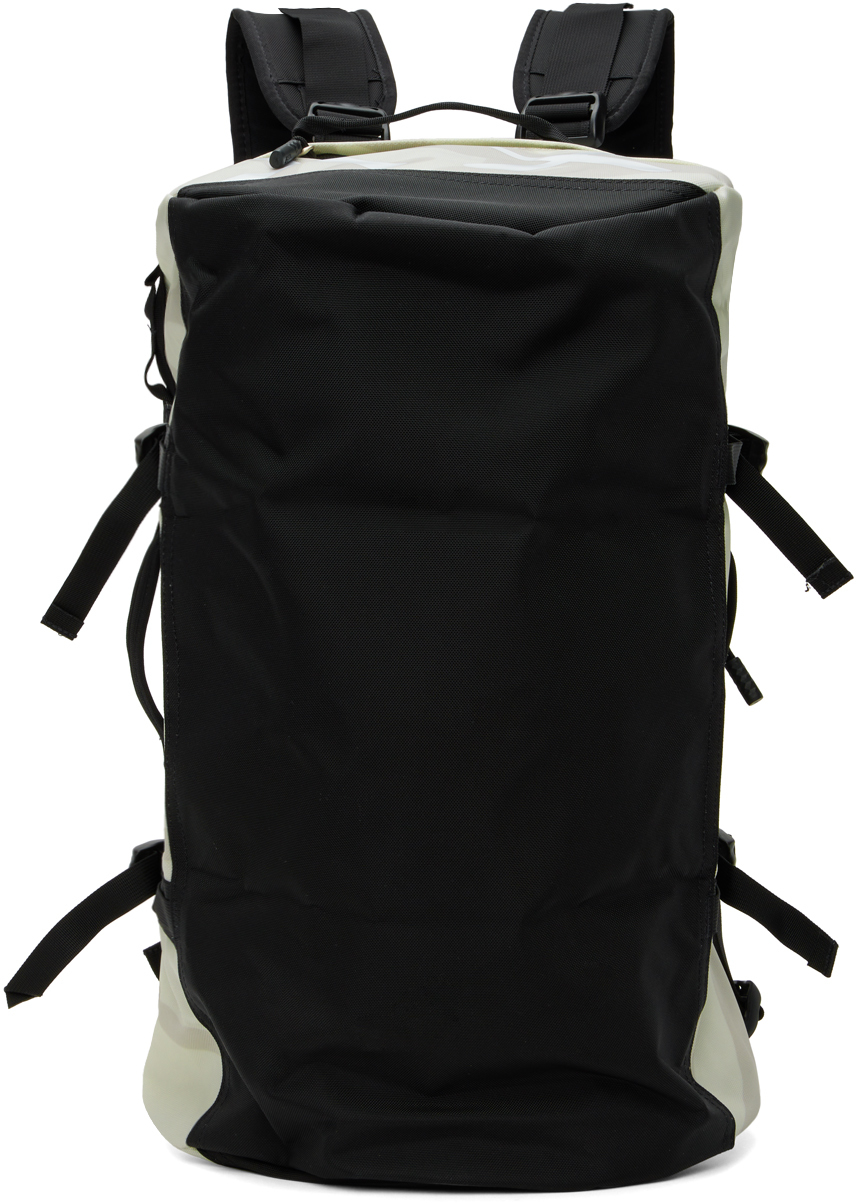 Beige KAWS Edition Base Camp Duffle Bag by The North Face on Sale