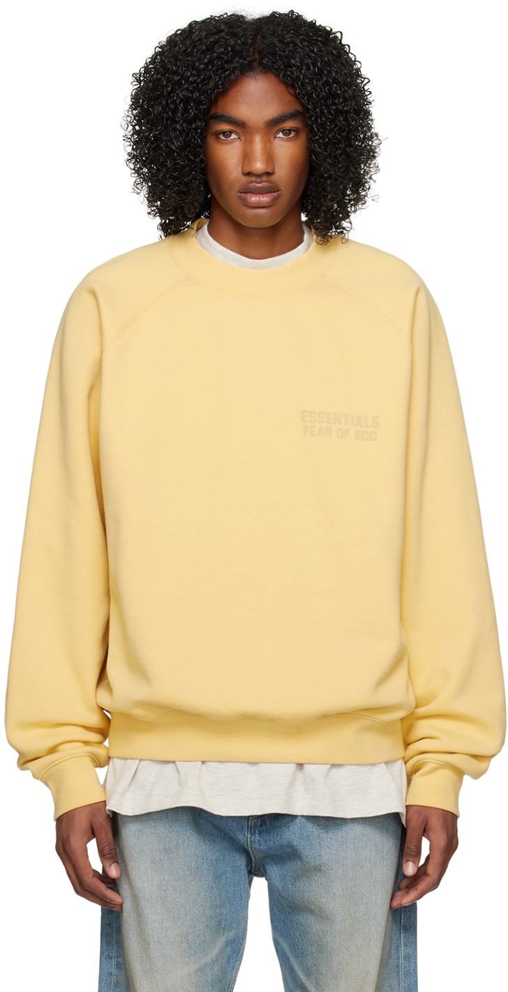 Fear of God ESSENTIALS: Yellow Raglan Sweatshirt | SSENSE Canada