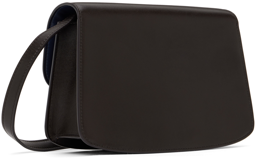 The Row Tasca Zip Crossbody Bag In Calf Leather in Black