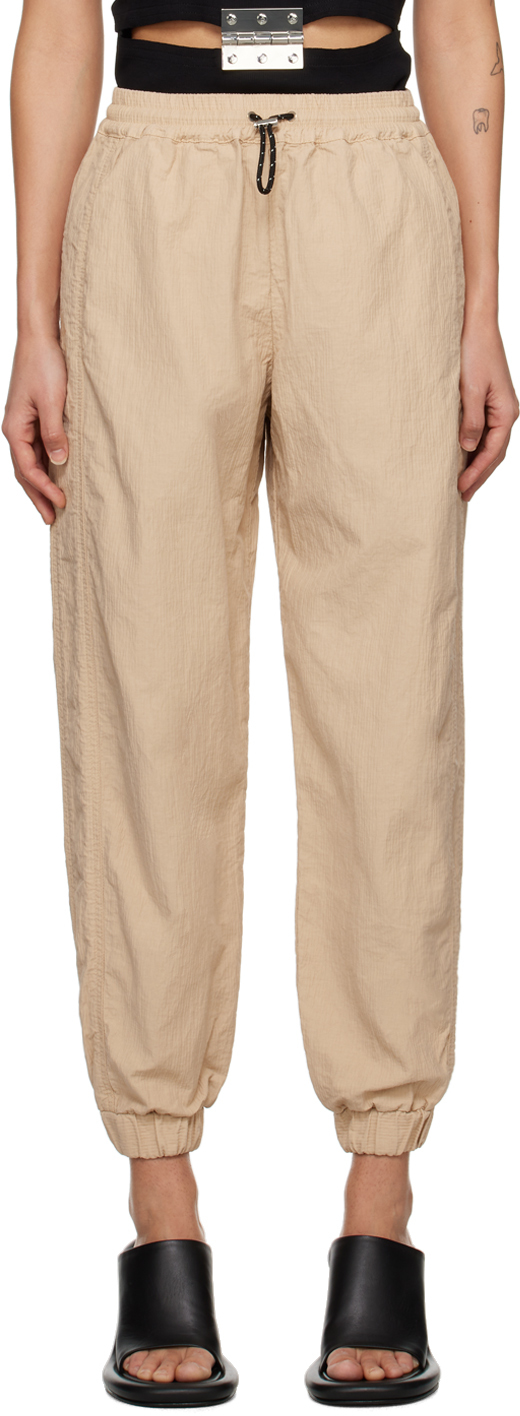 JW ANDERSON BEIGE TAPERED TRACK PANTS