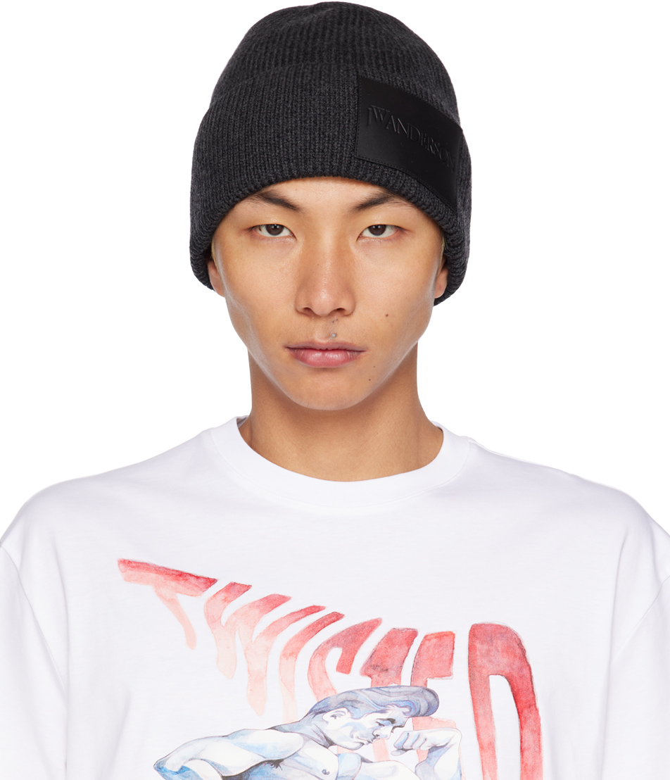 Jw Anderson Logo-patch Ribbed Beanie In Black