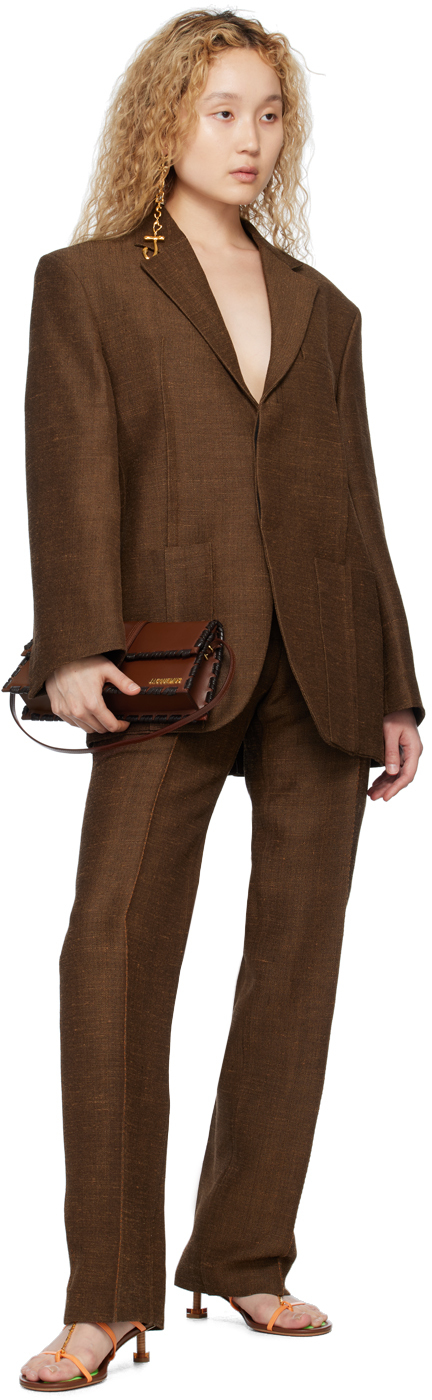 Jacquemus Stitch-detail Flared Trousers In 880 Dark Brown