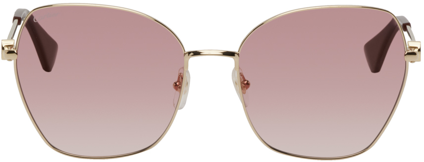 Cartier: Gold 'C de Cartier' Signature Sunglasses | SSENSE