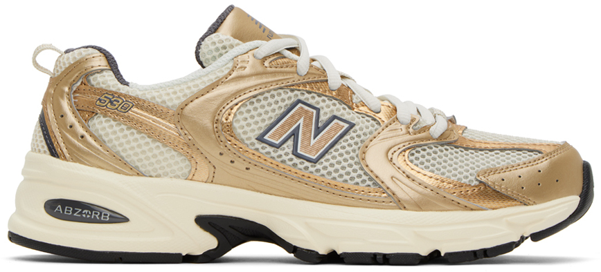 NEW BALANCE BEIGE & GOLD 530 SNEAKERS