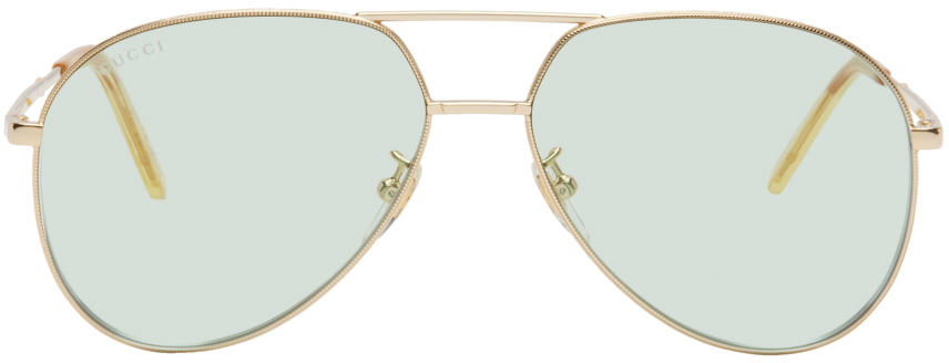 Gucci: Gold Aviator Sunglasses | SSENSE