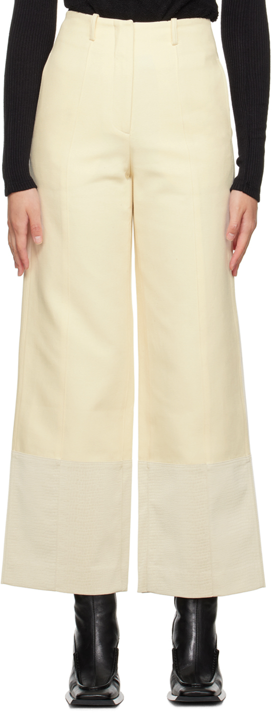 Kijun Off-white Embossed Trousers In Cream