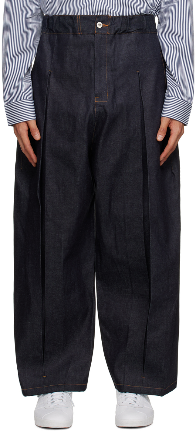 SAGE NATION: Navy Box Pleat Denim Jeans | SSENSE