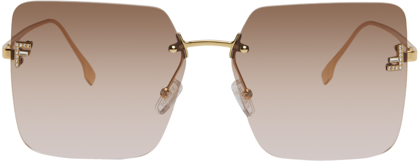 Fendi First - Gold metal sunglasses with gradient lenses