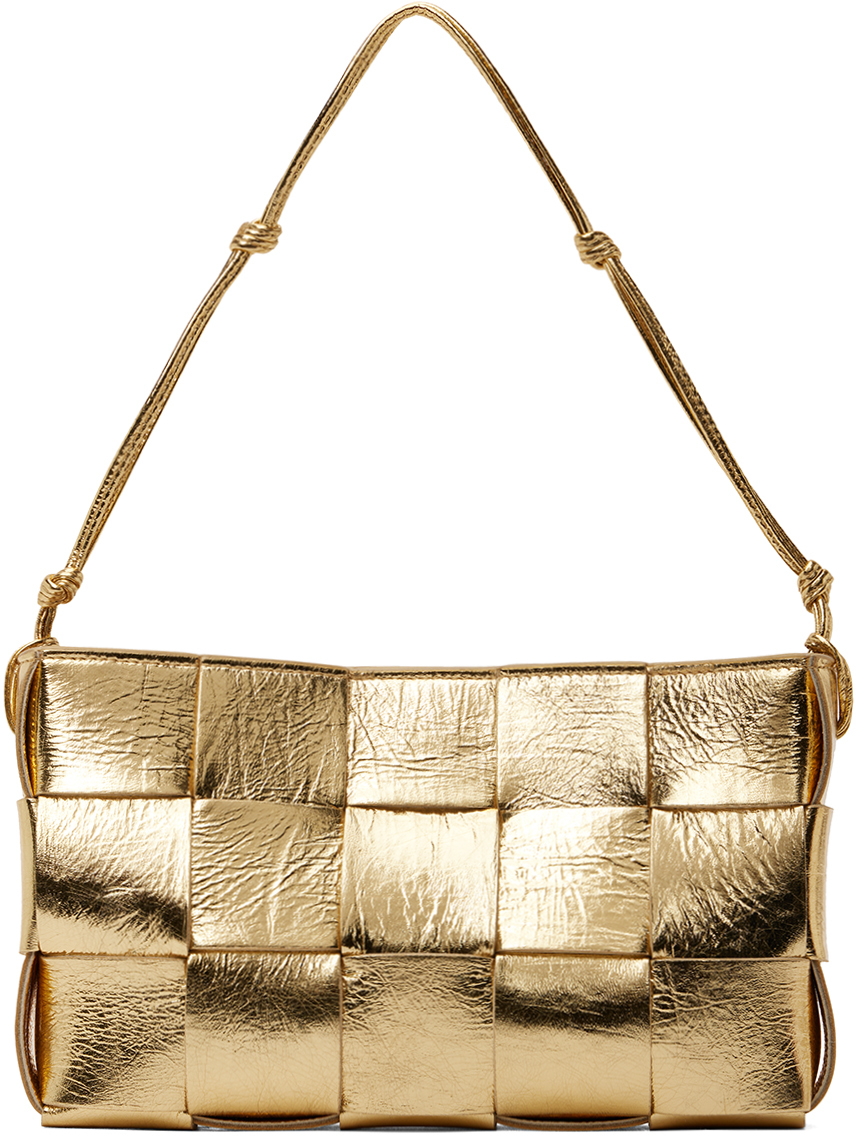 Bottega Veneta gold tone metallic leather mini clutch bag