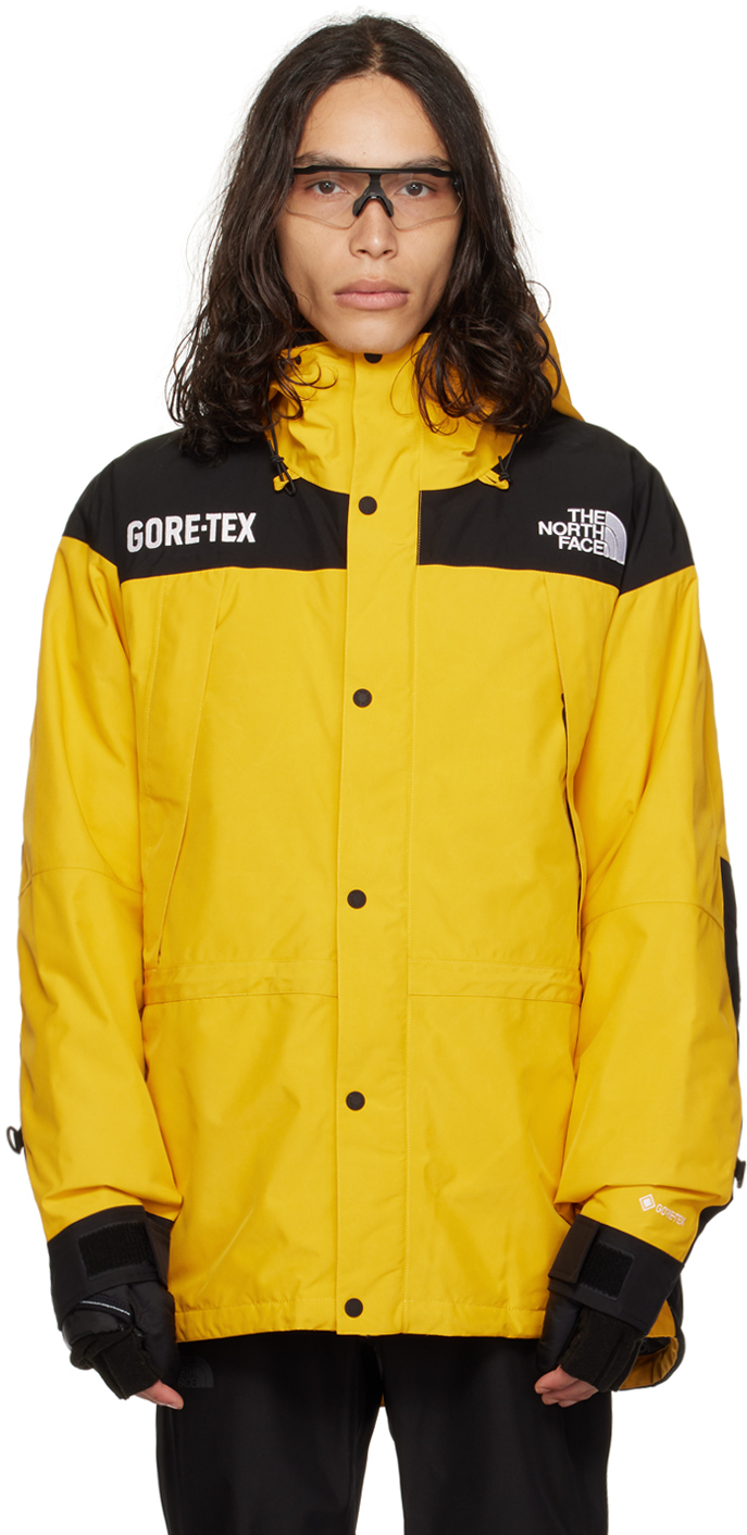 The North Face: Yellow GTX Mountain Down Jacket | SSENSE Canada