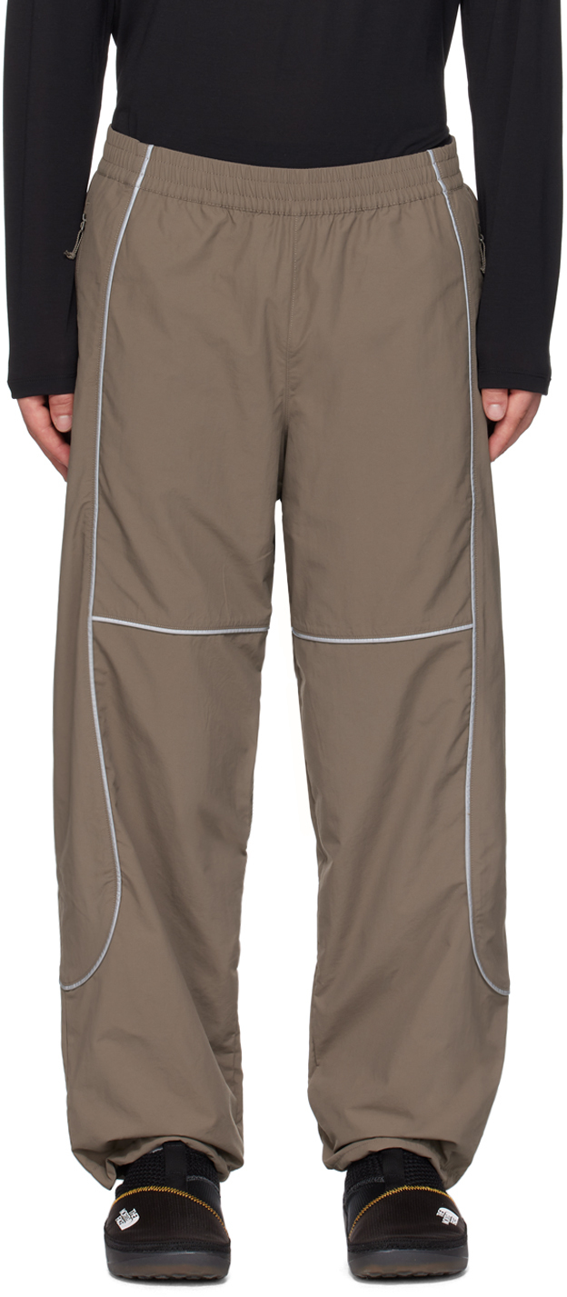 The North Face: Brown Tek Piping Wind Trousers | SSENSE Canada