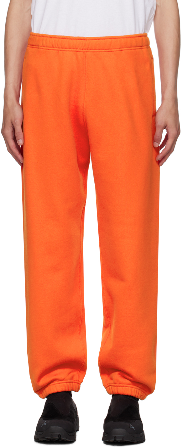 Stone Island Logo-print Fleece Track-pants In Orange