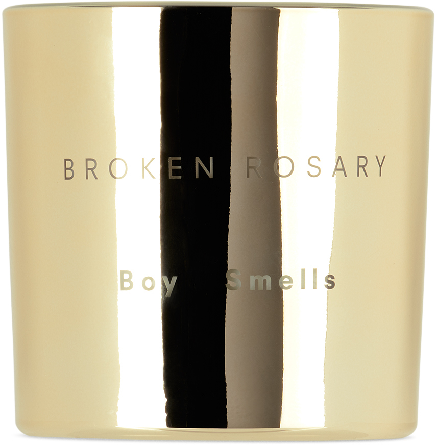 Boy Smells Broken Rosary Magnum Candle In Gold