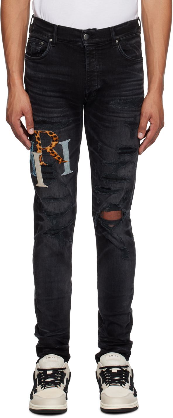 AMIRI: Black Staggered Jeans | SSENSE Canada