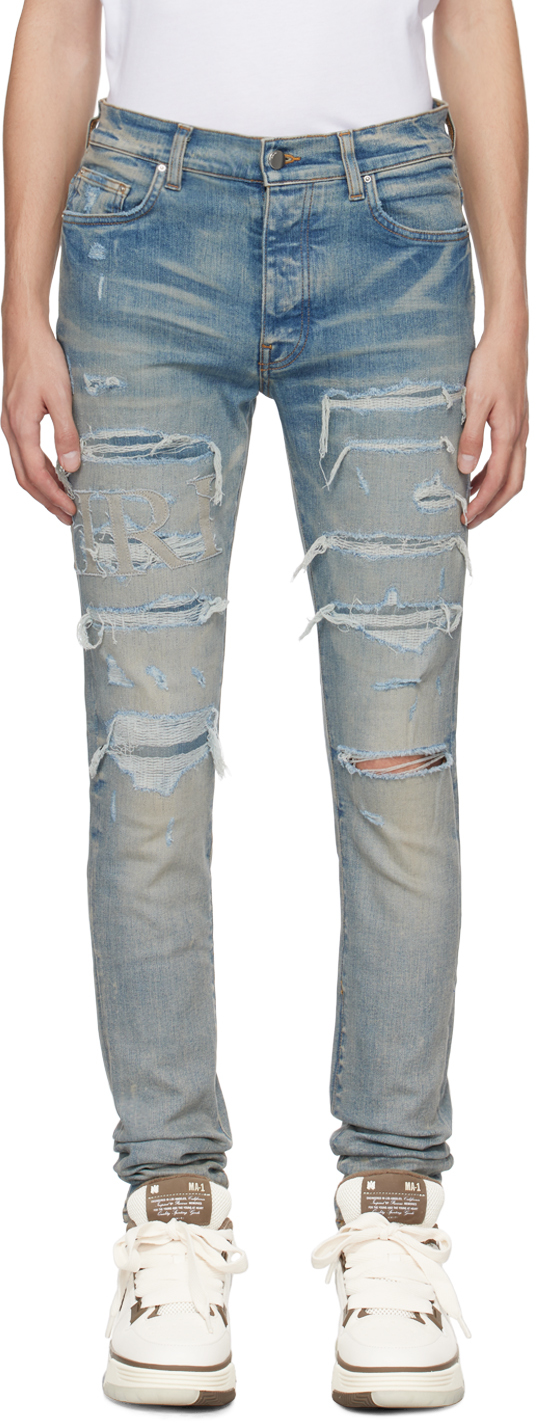 Shop Amiri Blue Repair Logo Thrasher Jeans In Clay Indigo
