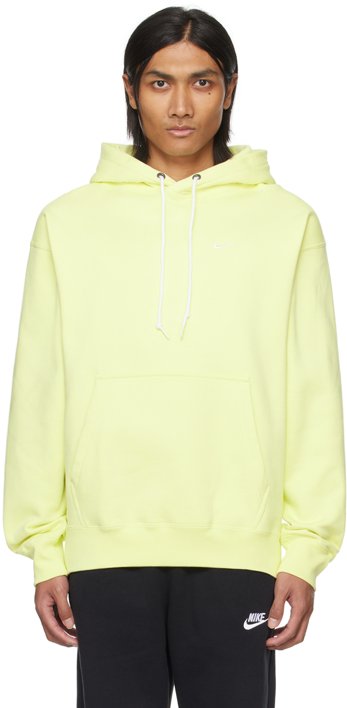 Shop Nike Yellow Solo Swoosh Hoodie In Luminous Green/white