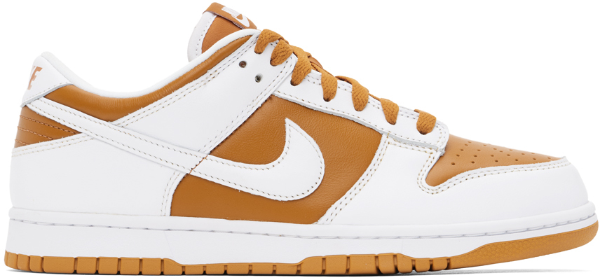 White & Orange Dunk Low Sneakers by Nike on Sale