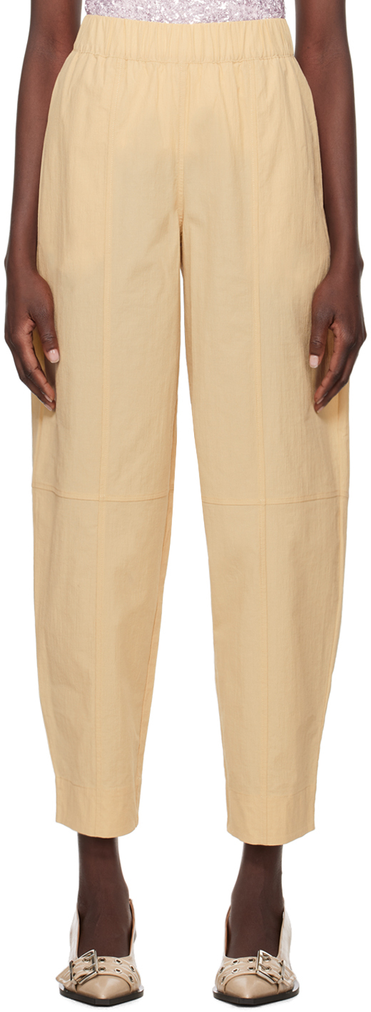 Shop Ganni Beige Curve Trousers In 883 Safari
