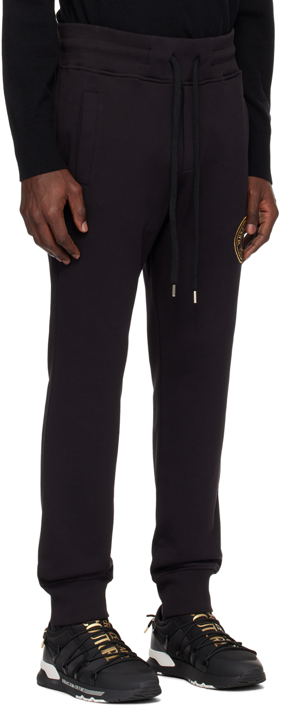 Shop Versace Jeans Couture Black V-emblem Sweatpants In Eg89 Black/gold