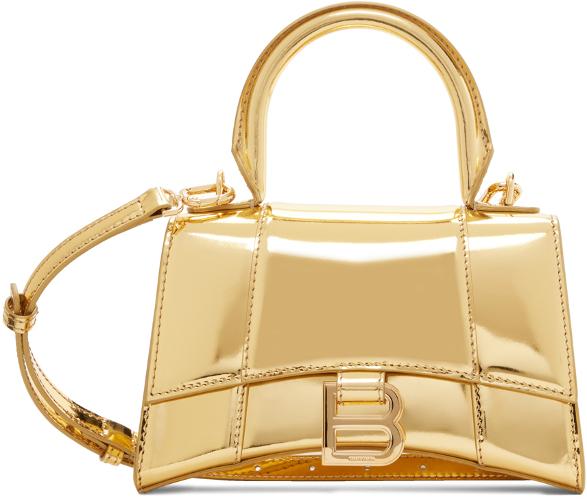 Shop Balenciaga Gold Xs Hourglass Bag In 8015 Gold