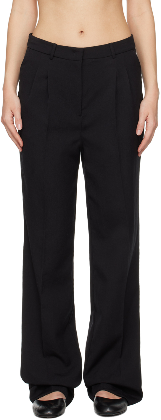 Black Pleated Trousers by The Garment on Sale