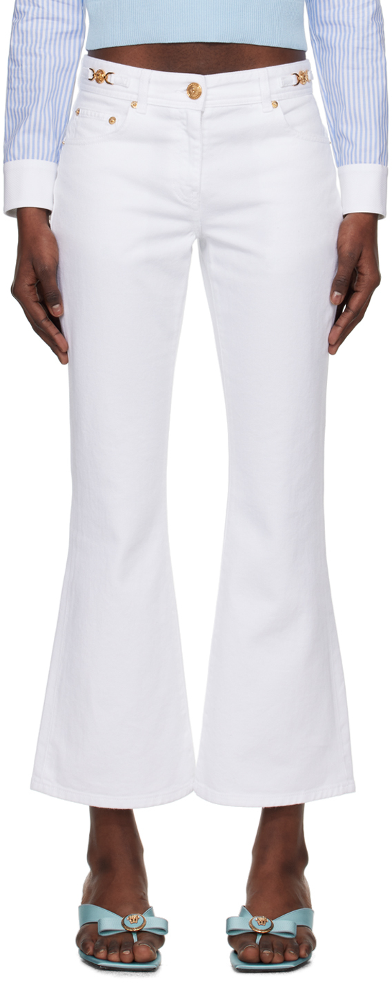 Shop Versace White Cropped Flared Jeans In 1d110-white