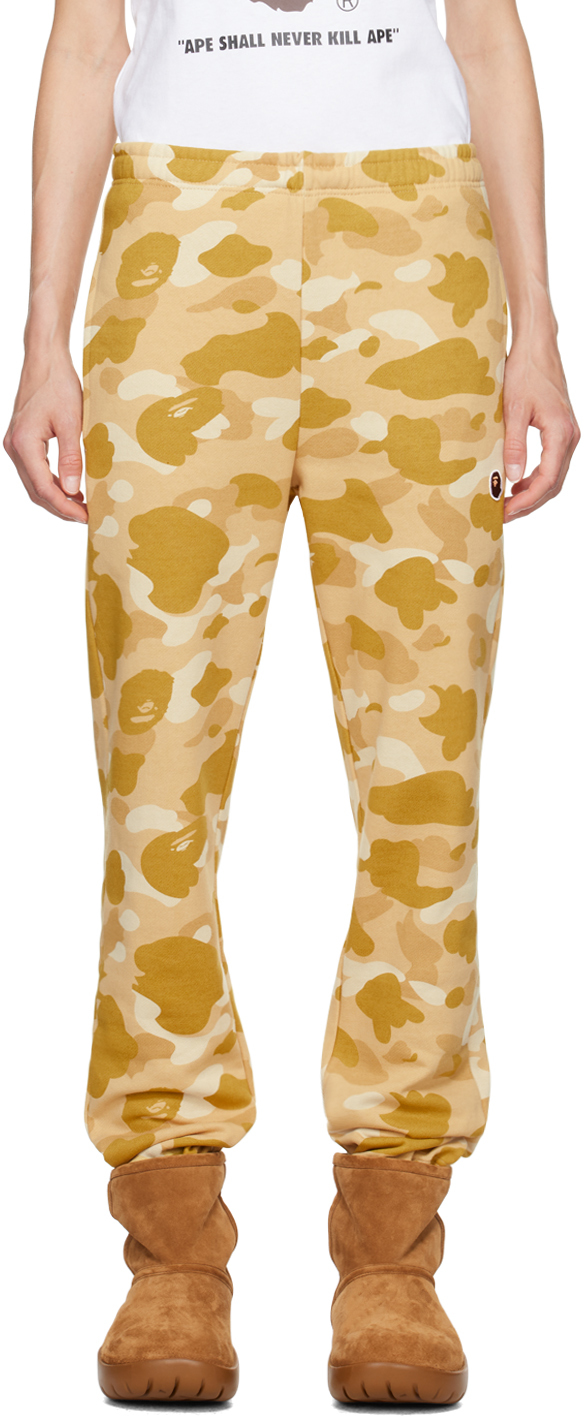 BAPE: Yellow Color Camo Sweatpants | SSENSE