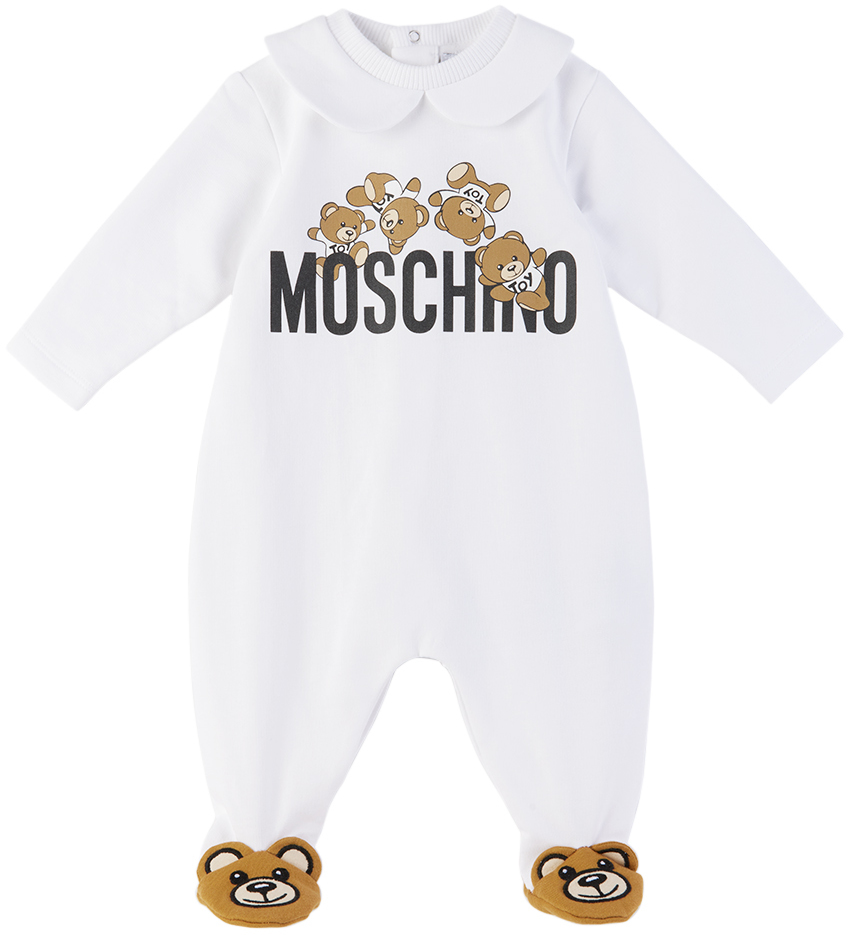 Shop Moschino Baby White Toy Print Jumpsuit In 10101 Opt White
